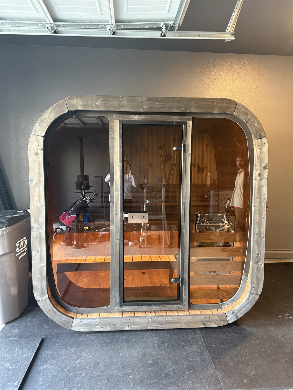 Sauna next to a home gym, shared by Rebecca Calzona.